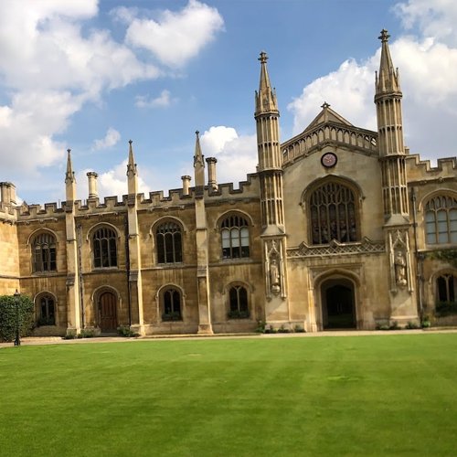 Gothic college building and lawn at the University of Cambridge